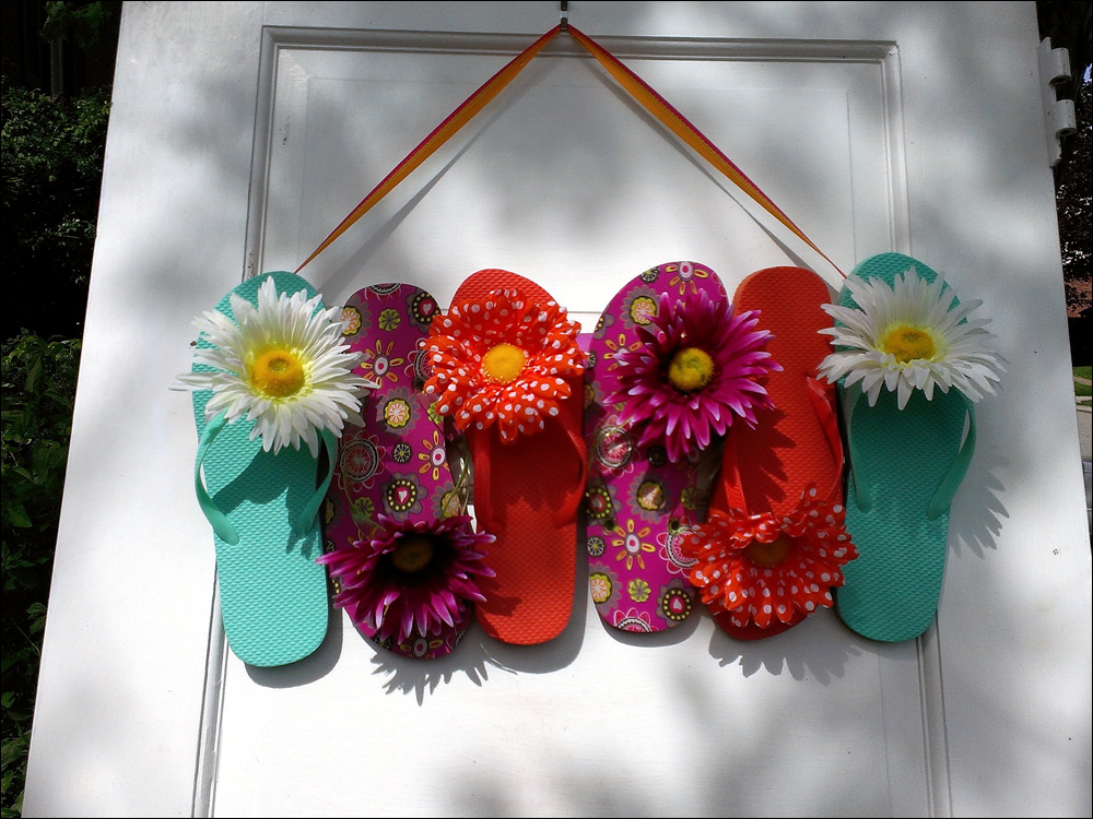 Summer flip flops repurposed as a door wreath.